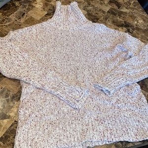 Medium crimson and cream sweater.